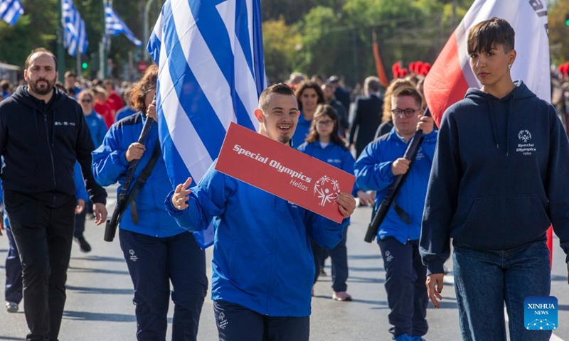 Members of the Greek Special Olympics team attend a national Ochi (No) Day parade in Athens, Greece, Oct. 28, 2023. Ochi was the response given on Oct. 28, 1940, by the then head of the Greek government to Italy's ultimatum to surrender the country to the Axis forces. It marked Greece's entry in World War Two.(Photo: Xinhua)