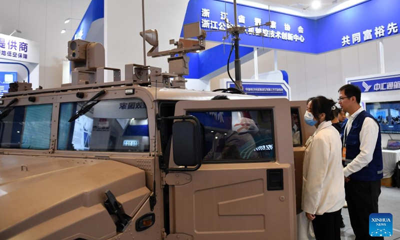 Visitors view a special vehicle at the Changsha International Conference Center during the second conference of the Global Economic Development and Security Forum of the Boao Forum for Asia (BFA) in Changsha, central China's Hunan Province, Oct. 29, 2023. The conference opened in Changsha, capital city of central China's Hunan Province, on Sunday. (Photo: Xinhua)