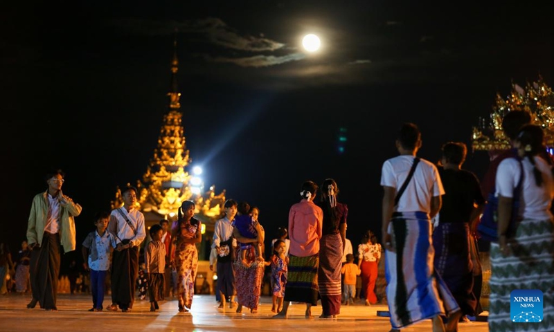 People visit the Uppatasanti Pagoda during the Thadingyut Festival in Nay Pyi Taw, Myanmar, Oct. 29, 2023. Myanmar's traditional Thadingyut festival starts on Oct. 28 this year. The Thadingyut Festival, known as the the lighting festival, is traditionally celebrated for three days. (Photo: Xinhua)