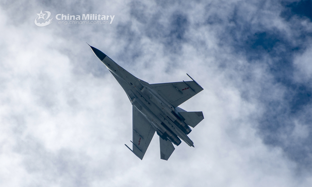 A fighter jet attached to an aviation brigade with the air force under the PLA Eastern Theater Command maneuvers in the sky during a tactical flight training exercise on October 18, 2023. Photo:China Military