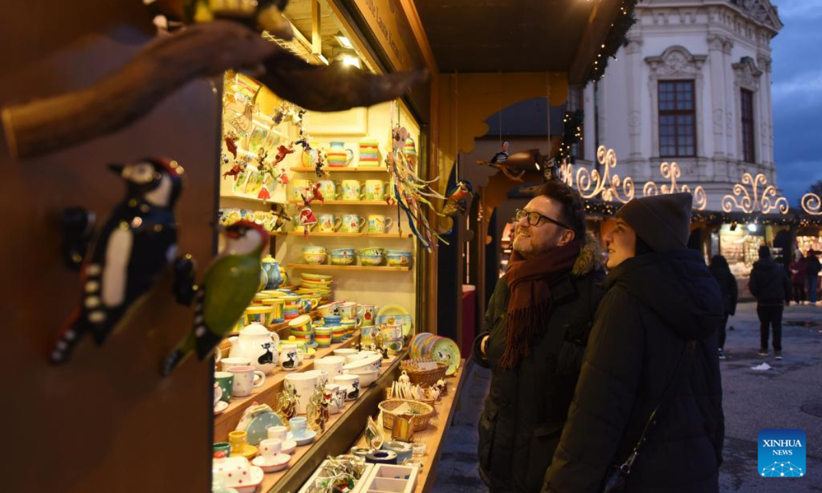 People select Christmas ornaments at the Christmas market of Belvedere, Vienna, Austria, Nov 17, 2023. Photo:Xinhua