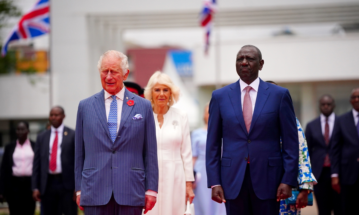 Britain's King Charles III (left) stands with the President of the Republic of Kenya, William Ruto, ahead of a wreath-laying ceremony at the tomb of the Unknown Warrior, in Uhuru Gardens on October 31, 2023 in Nairobi, Kenya. King Charles and his wife Queen Camilla are on a four-day state visit to Kenya, where he is expected to acknowledge 