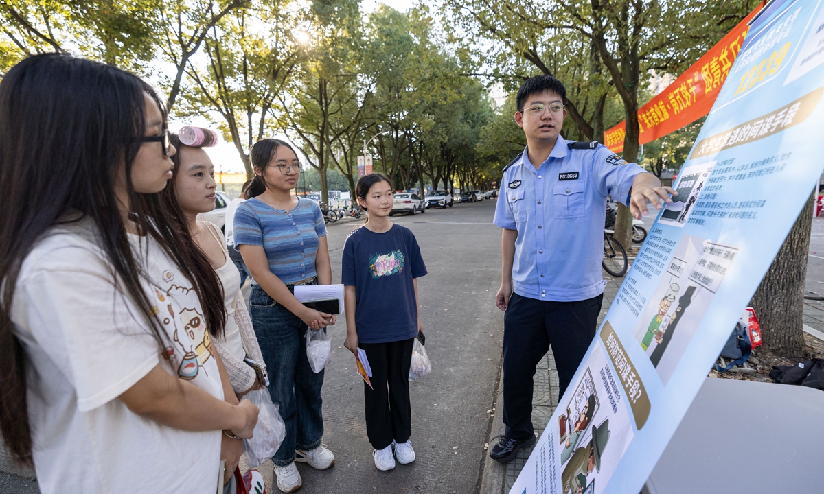 As November 1, 2023 marks China's Anti-Espionage Day, a community worker explains relevant knowledge to primary school students in Huzhou, East China's Zhejiang Province, to enhance the awareness of teenagers in countering espionage and safeguarding national security. Photo: VCG