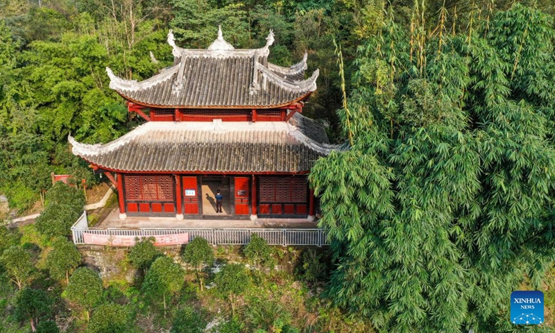 This aerial photo taken on Oct. 31, 2023 shows a cultural relics protection site of Dazu Rock Carvings in Baoding Town of Dazu District, southwest China's Chongqing Municipality. Dazu Rock Carvings originated from Sichuan and Chongqing regions in ancient China. In 1999, the carvings were added to the UNESCO World Heritage List as a cultural heritage site.(Photo: Xinhua)