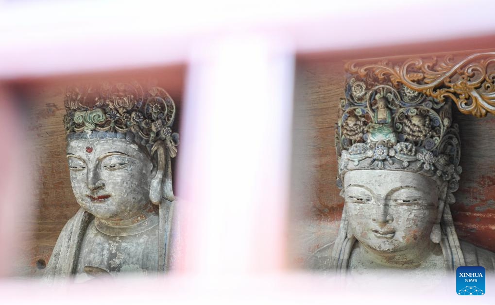 This photo taken on Oct. 31, 2023 shows a view at a cultural relics protection site of Dazu Rock Carvings in Baoding Town of Dazu District, southwest China's Chongqing Municipality. Dazu Rock Carvings originated from Sichuan and Chongqing regions in ancient China. In 1999, the carvings were added to the UNESCO World Heritage List as a cultural heritage site.(Photo: Xinhua)