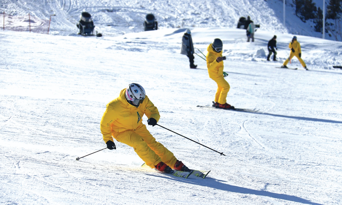 Skiers enjoy the slopes at an international ski resort located in Altay, Northwest China's Xinjiang Uygur Autonomous Region, on November 9, 2023. The resort held an opening ceremony for the ski season and welcomed the first batch of ski enthusiasts for the winter that day. Photo: VCG