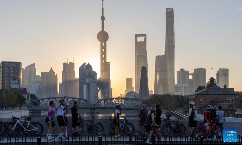 This photo taken on Nov. 3, 2023 shows a city view of Shanghai at sunrise. The 6th China International Import Expo (CIIE) is scheduled to be held in Shanghai from Nov. 5 to 10. The expo showcases China's new development paradigm, a platform for high-standard opening up, and a public good for the whole world. (Photo: Xinhua)