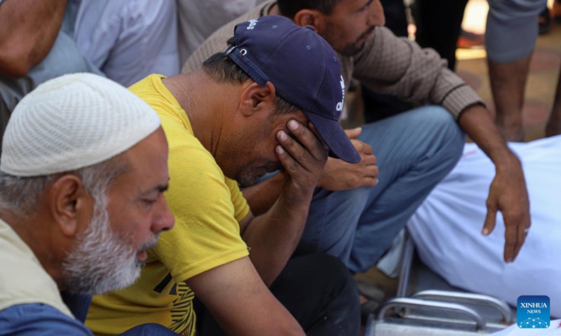 People mourn for victims killed in the Palestinian-Israeli conflict in the southern Gaza Strip city of Khan Younis, on Nov. 5, 2023. (Photo: Xinhua)