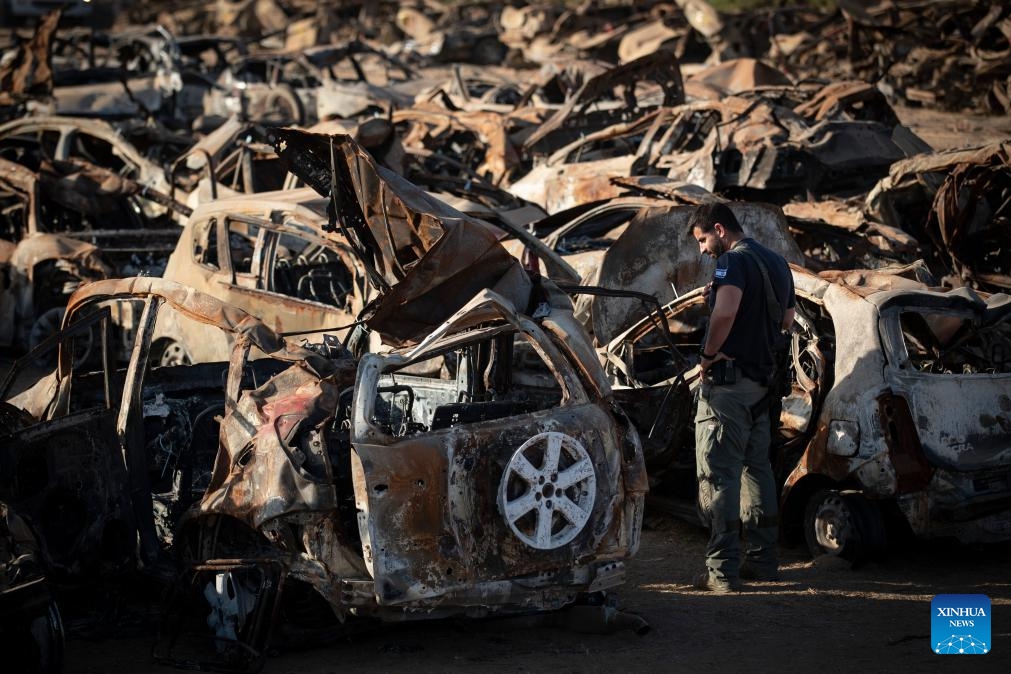 This photo taken on Nov. 6, 2023 shows burnt vehicles placed outside the city of Netivot in southern Israel. These collected vehicles were destroyed in a surprise attack by Gaza-ruling Hamas militants on Israeli military targets and towns on Oct. 7.(Photo: Xinhua)