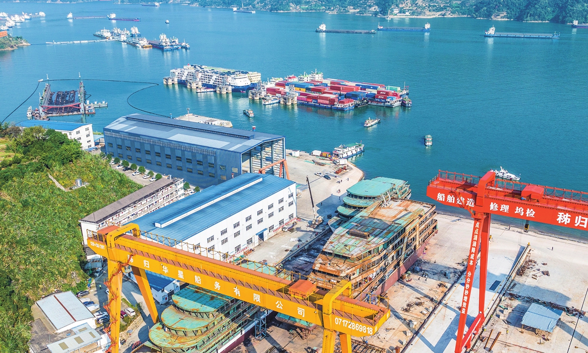 A new-energy cruise ship is being constructed at a local shipyard in Yichang city, central China's Hubei Province, on November 8, 2023. The ship will have a test run in the Yangtze River soon. As tourism and inner-river freight transport rapidly recover and heat up post-pandemic, domestic shipbuilding industry is ushering in a new golden age. Photo: VCG