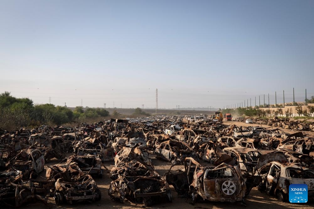 This photo taken on Nov. 6, 2023 shows burnt vehicles placed outside the city of Netivot in southern Israel. These collected vehicles were destroyed in a surprise attack by Gaza-ruling Hamas militants on Israeli military targets and towns on Oct. 7.(Photo: Xinhua)