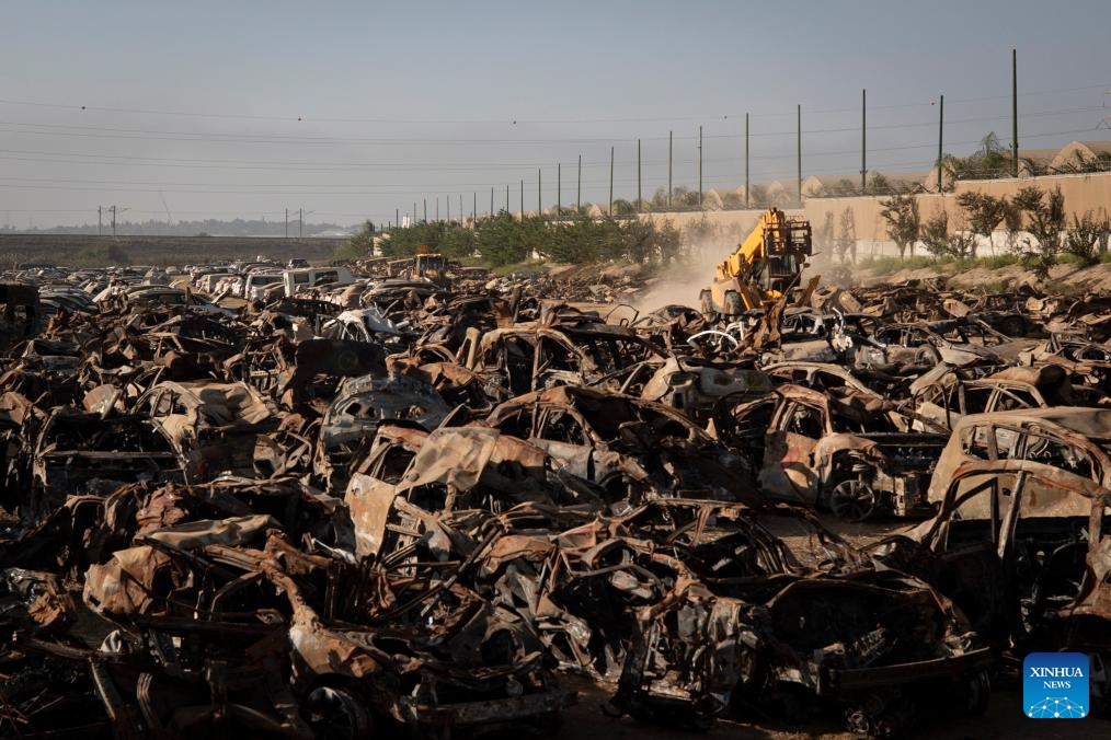 This photo taken on Nov. 6, 2023 shows burnt vehicles placed outside the city of Netivot in southern Israel. These collected vehicles were destroyed in a surprise attack by Gaza-ruling Hamas militants on Israeli military targets and towns on Oct. 7.(Photo: Xinhua)