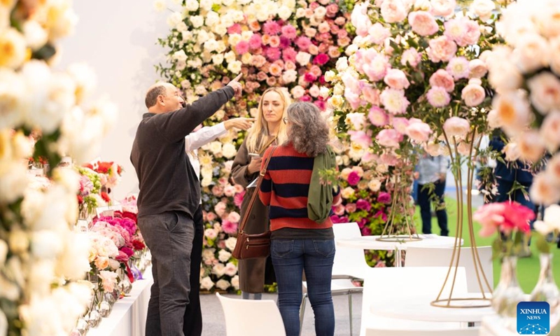 People visit 2023 International Floriculture Trade Fair (IFTF) in Vijfhuizen, the Netherlands, Nov. 8, 2023. The IFTF is an annual event in the Netherlands that brings together horticultural professionals, flower lovers and industry experts from around the world.(Photo: Xinhua)