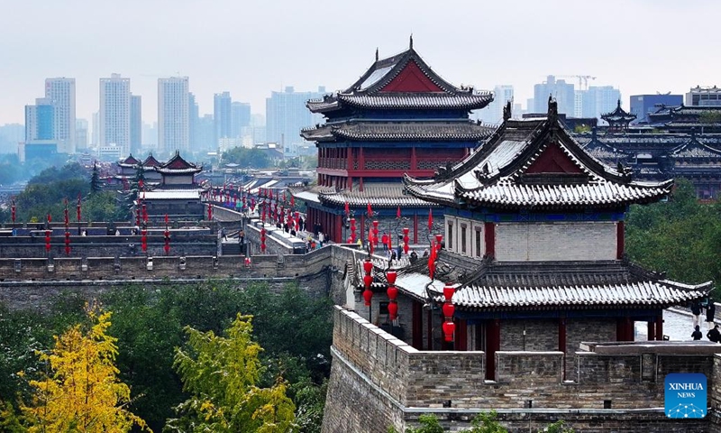 This aerial photo taken on Nov. 11, 2023 the view of snow-covered ancient city wall in Xi'an, northwest China's Shaanxi Province. Xi'an witnessed a snowfall on Saturday, the first one after traditional solar term of Lidong, which means the beginning of winter and fell on Nov. 8 this year. (Photo: Xinhua)