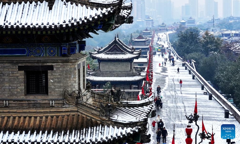 This aerial photo taken on Nov. 11, 2023 the view of snow-covered ancient city wall in Xi'an, northwest China's Shaanxi Province. Xi'an witnessed a snowfall on Saturday, the first one after traditional solar term of Lidong, which means the beginning of winter and fell on Nov. 8 this year. (Photo: Xinhua)