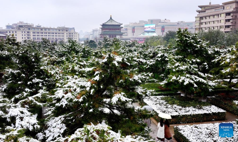 This aerial photo taken on Nov. 11, 2023 the view of snow-covered Bell Tower in Xi'an, northwest China's Shaanxi Province. Xi'an witnessed a snowfall on Saturday, the first one after traditional solar term of Lidong, which means the beginning of winter and fell on Nov. 8 this year. (Photo: Xinhua)