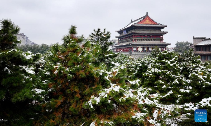 This aerial photo taken on Nov. 11, 2023 the view of snow-covered Drum Tower in Xi'an, northwest China's Shaanxi Province. Xi'an witnessed a snowfall on Saturday, the first one after traditional solar term of Lidong, which means the beginning of winter and fell on Nov. 8 this year. (Photo: Xinhua)