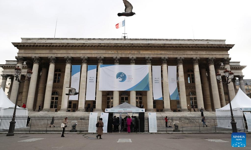 A pigeon flies in front of the venue of Paris Peace Forum in Paris, France, Nov. 10, 2023. (Photo: Xinhua)