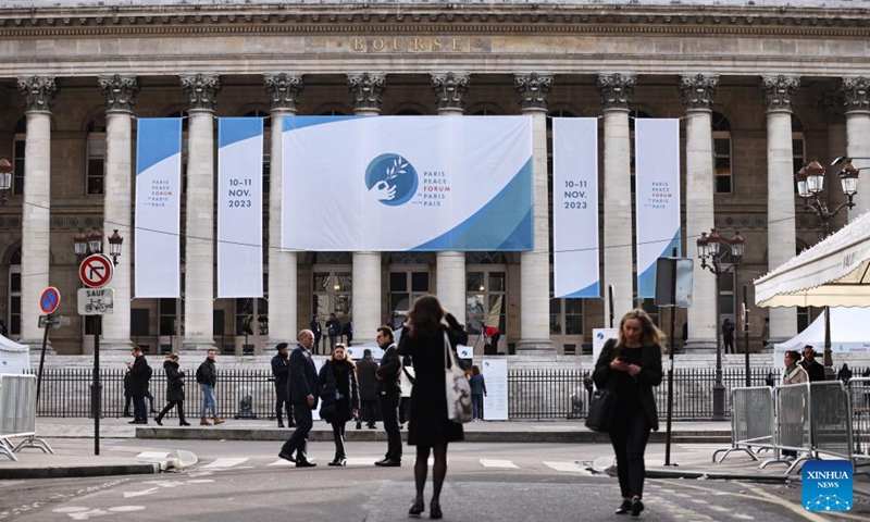 People gather outside the venue of Paris Peace Forum in Paris, France, Nov. 10, 2023.  (Photo: Xinhua)