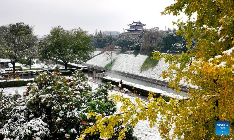 This aerial photo taken on Nov. 11, 2023 the view of snow-covered ancient city wall in Xi'an, northwest China's Shaanxi Province. Xi'an witnessed a snowfall on Saturday, the first one after traditional solar term of Lidong, which means the beginning of winter and fell on Nov. 8 this year. (Photo: Xinhua)