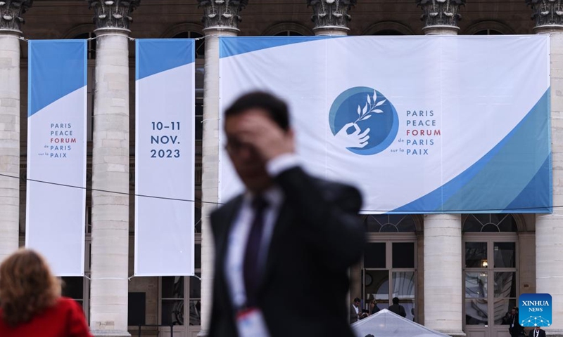 Guests walk outside the venue of Paris Peace Forum in Paris, France, Nov. 10, 2023.  (Photo: Xinhua)