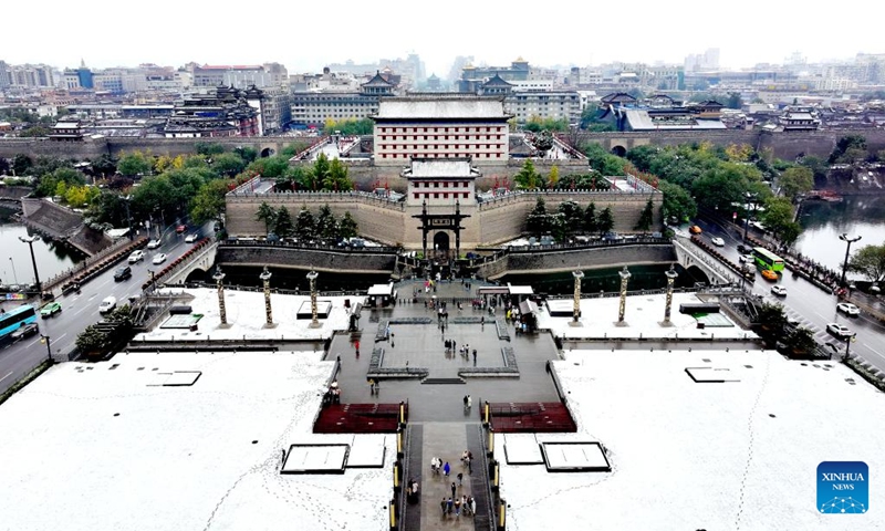 This aerial photo taken on Nov. 11, 2023 the view of snow-covered ancient city wall in Xi'an, northwest China's Shaanxi Province. Xi'an witnessed a snowfall on Saturday, the first one after traditional solar term of Lidong, which means the beginning of winter and fell on Nov. 8 this year. (Photo: Xinhua)