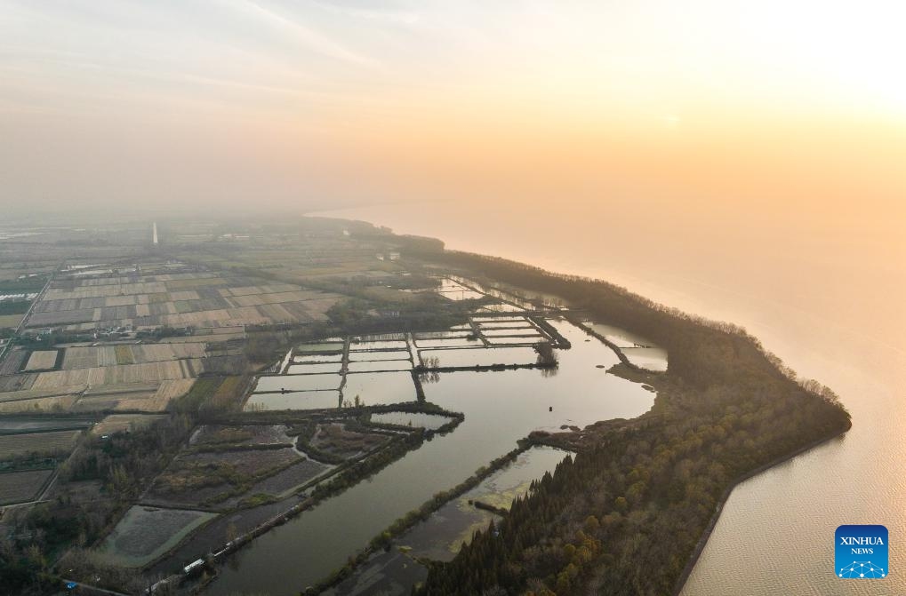 This aerial photo taken on Nov. 8, 2023 shows a view of Hongze Lake in Huai'an, east China's Jiangsu Province. The Hongze Lake Irrigation System in eastern Jiangsu Province is a water storage irrigation area. Since the Eastern Han Dynasty (25-220), ancient people have diverted water for irrigation and farming. The irrigation system, which has been designated as World Heritage Irrigation Structures (WHIS) in 2023, nowadays keeps irrigating farmland.(Photo: Xinhua)