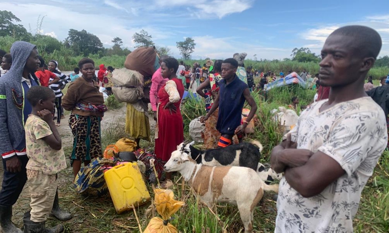 Congolese refugees are on their way to a holding center in the district of Bundibugyo, western Uganda, on Nov. 13, 2023. More than 1,000 refugees from the Democratic Republic of the Congo (DRC) have fled to Uganda following recent attacks by suspected Allied Democratic Forces (ADF) rebels, according to a local humanitarian organization. (Photo: Xinhua)