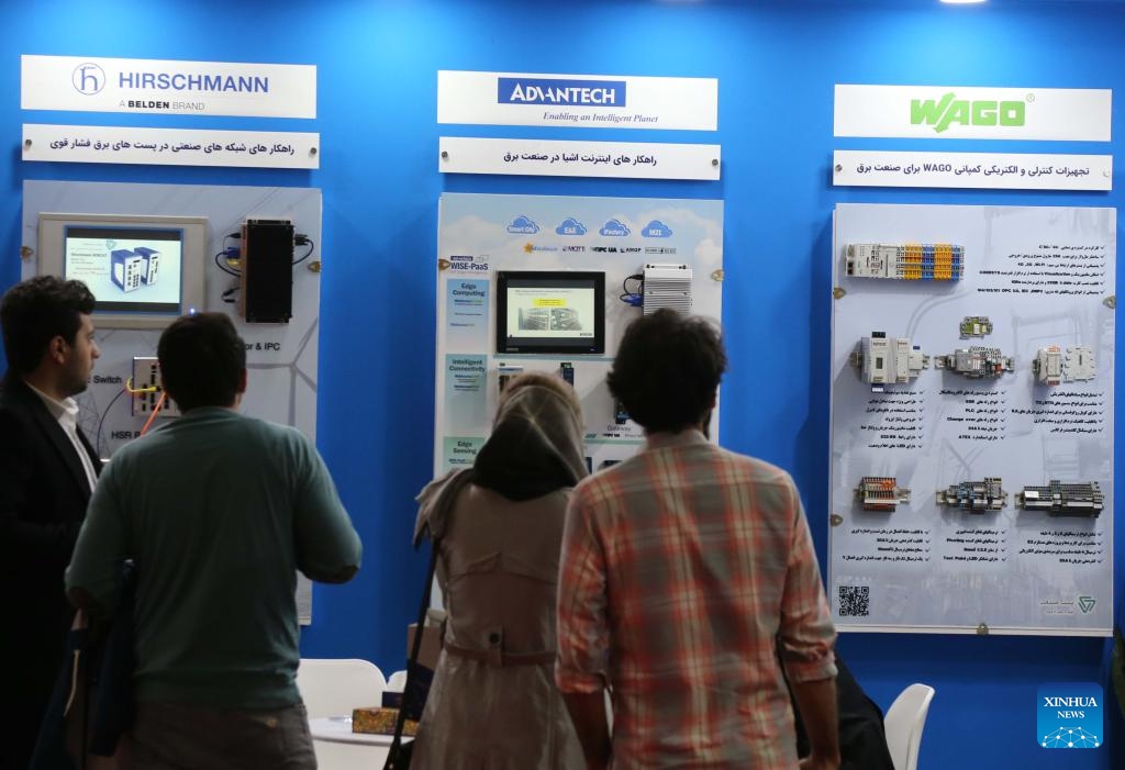 People attend the Iran International Electricity Exhibition in Tehran, Iran, on Nov. 14, 2023. This exhibition kicked off here on Tuesday and will last to Nov. 17, 2023.(Photo: Xinhua)