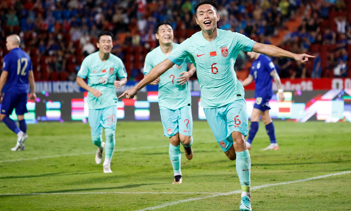 Chinese football player Wang Shangyuan (front) celebrates scoring their second goal against Thailand in their World Cup qualifying match on November 16, 2023 in Bangkok, Thailand. After a come-from-behind 2-1 victory, Team China will face South Korea on home turf on November 21. The long road to the 2026 World Cup began in earnest in Asia with 36 teams in action on Thursday. The top two from each group go through to the final qualifying round in Asia. Photo: VCG