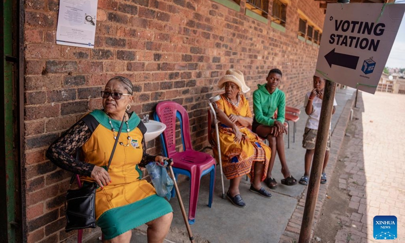 People wait for voter registration at a voting station in Soweto, Johannesburg, South Africa, Nov. 18, 2023. The South African government on Friday called on the citizens to register to vote during the registration weekend so that they will be able to vote in the 2024 elections. (Photo: Xinhua)