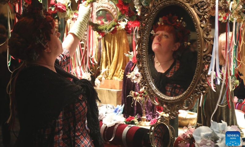 Artists wearing costumes of the Victorian era perform during the Great Dickens Christmas Fair in San Francisco, the United States, Nov. 18, 2023. The Great Dickens Christmas Fair, which was first held in 1970, opened in San Francisco on Saturday. The fair is aimed at attracting people to enjoy the culture of the Victorian era by recalling the characters and scenes in the works of British novelist Charles Dickens. (Photo: Xinhua)
