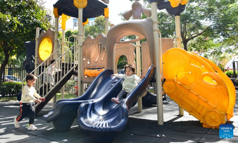 Kids play at a children's park in Shangwei Village, a child-friendly arts village, in Longhua District of Shenzhen, south China's Guangdong Province, Nov. 19, 2023. Shenzhen launched China's first guidelines for building a child-friendly city eight years ago. Since then the city has been rolling out a spate of measures spearheading the construction towards this aim. (Photo: Xinhua)