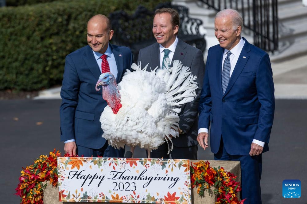 U.S. President Joe Biden (R) attends the National Thanksgiving Turkey Pardoning Ceremony at the White House in Washington, D.C., the United States, on Nov. 20, 2023(Photo: Xinhua)