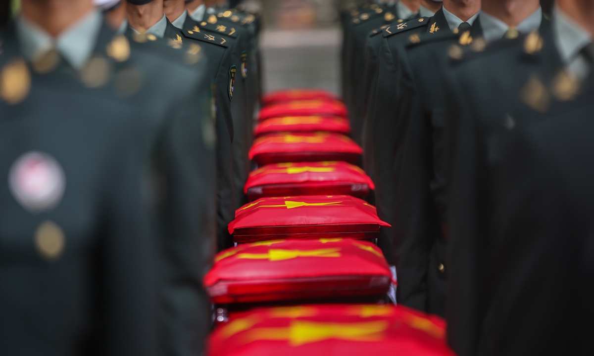 Soldiers take part in a burial ceremony in Shenyang, Northeast China's Liaoning Province, for Chinese People's Volunteers (CPV) martyrs who sacrificed their lives in the War to Resist US Aggression and Aid Korea (1950-53), on September 17, 2022. These martyrs were part of the 9th batch of the remains handed over to China from South Korea. Photo: VCG.