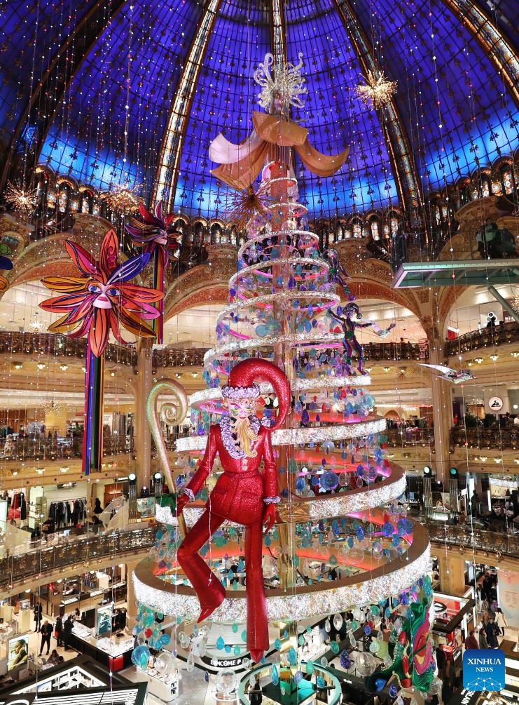 A giant Christmas tree is seen at the Galeries Lafayette department store in Paris, France, Nov. 21, 2023.(Photo: Xinhua)