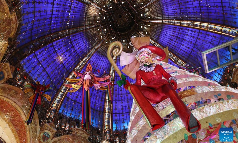 A giant Christmas tree is seen at the Galeries Lafayette department store in Paris, France, Nov. 21, 2023.(Photo: Xinhua)