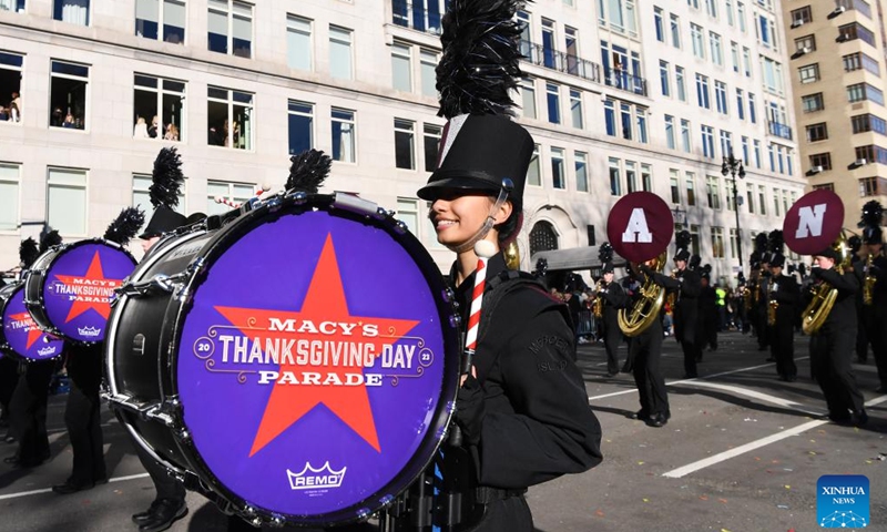 A band marches during the 2023 Macy's Thanksgiving Day Parade in New York, the United States, on Nov. 23, 2023. (Photo: Xinhua)