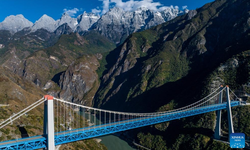 This aerial photo taken on Nov. 25, 2023 shows the Jinsha River grand bridge on the Lijiang-Shangri-La railway in southwest China's Yunnan Province. Linking Lijiang and Shangri-La in southwest China's Yunnan, the Lijiang-Shangri-La railway will be open to traffic on Sunday.  (Photo: Xinhua)