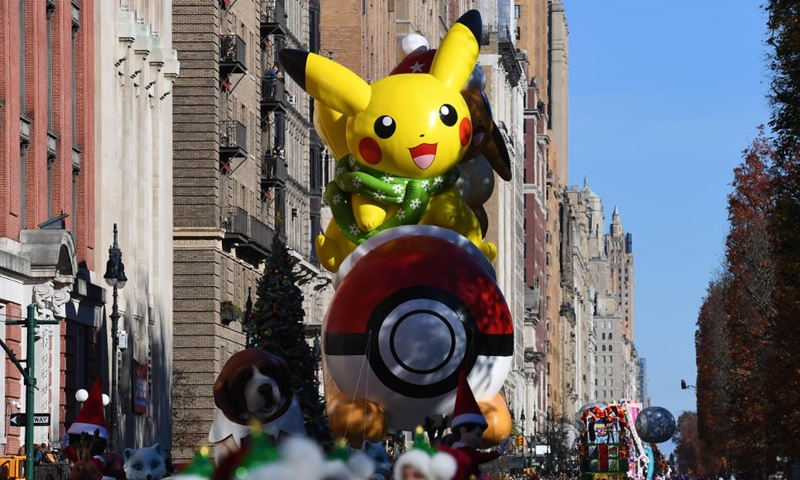 The balloon of Pikachu and Eevee is seen during the 2023 Macy's Thanksgiving Day Parade in New York, the United States, on Nov. 23, 2023. (Photo: Xinhua)