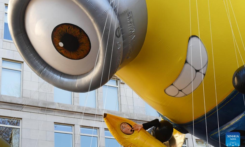 The balloon of Stuart the Minion is seen during the 2023 Macy's Thanksgiving Day Parade in New York, the United States, on Nov. 23, 2023. (Photo: Xinhua)