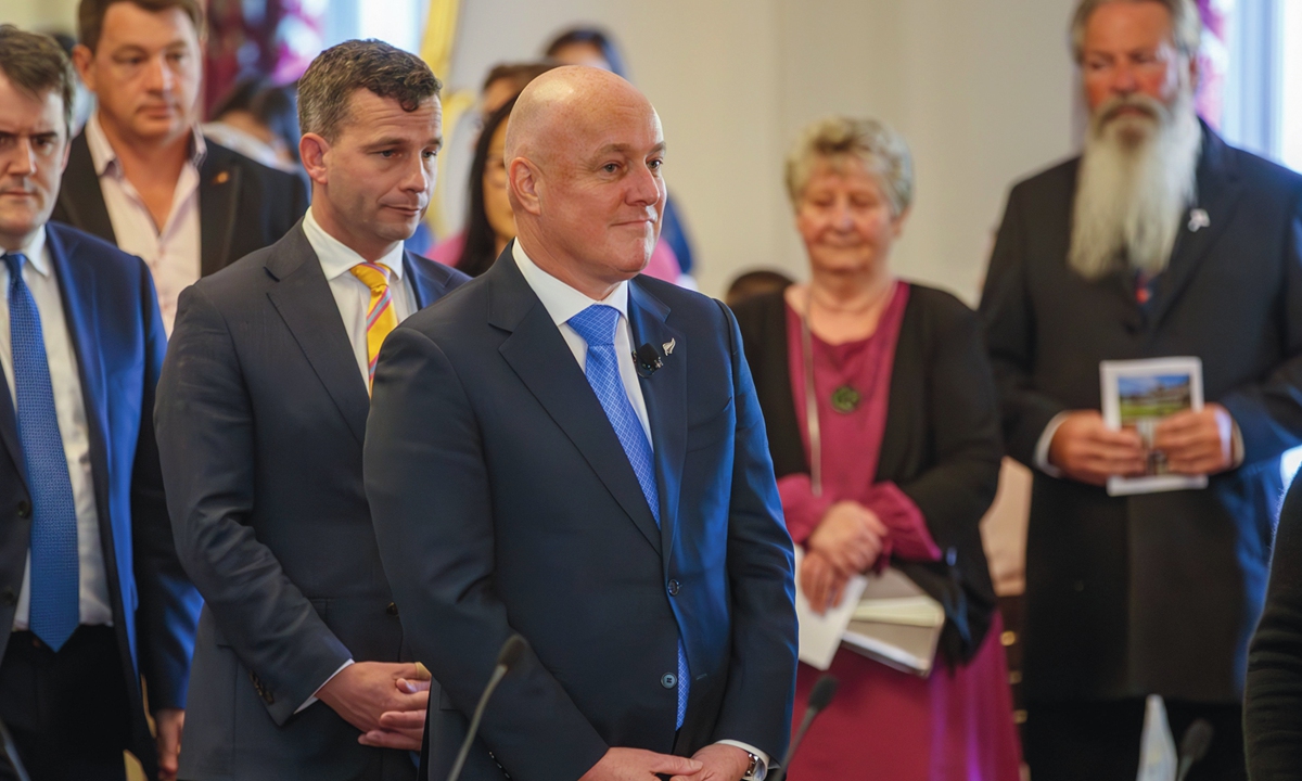 New Zealand Prime Minister Christopher Luxon (center) stands during the swearing-in ceremony at Government House in Wellington, New Zealand, on November 27, 2023. Luxon said his top priority was to improve the economy. Photo: VCG