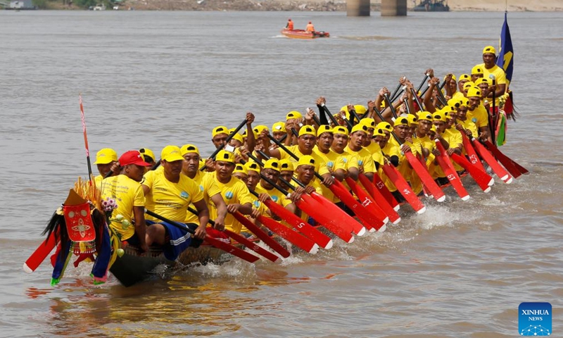 Oarsmen take part in the boat race in the Tonle Sap river during the Water Festival in Phnom Penh, Cambodia, Nov. 26, 2023. The annual Water Festival, Cambodia's grandest festival, returned on Sunday after a three-year hiatus due to the COVID-19 pandemic. (Photo: Xinhua)