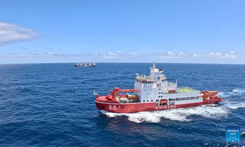 This aerial photo shows China's research icebreaker Xuelong 2 (front) and cargo vessel Tian Hui sailing in the belt of prevailing westerlies on Nov. 25, 2023. Currently on an Antarctic expedition, the icebreaker, otherwise known as Snow Dragon 2, is ploughing through the belt of prevailing westerlies, nicknamed the rolling forties, with its companion cargo vessel Tian Hui. (Photo: Xinhua)