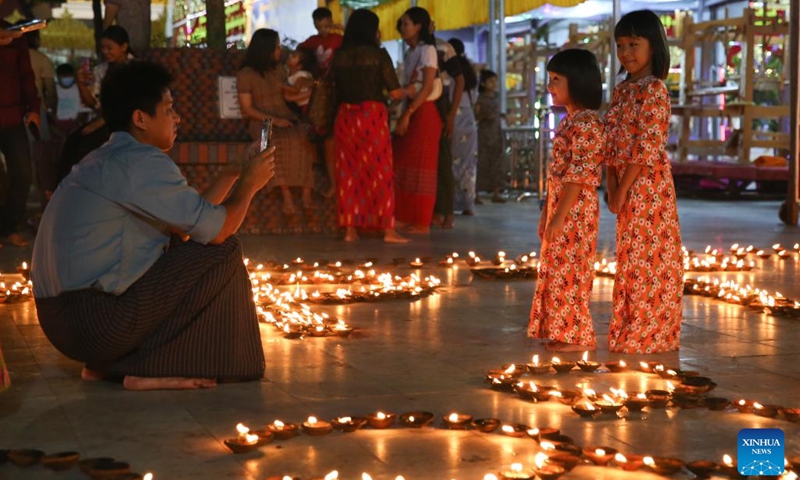 People celebrate the Tazaungdaing festival, also known as the Festival of Lights, in Yangon, Myanmar, Nov. 27, 2023.(Photo: Xinhua)