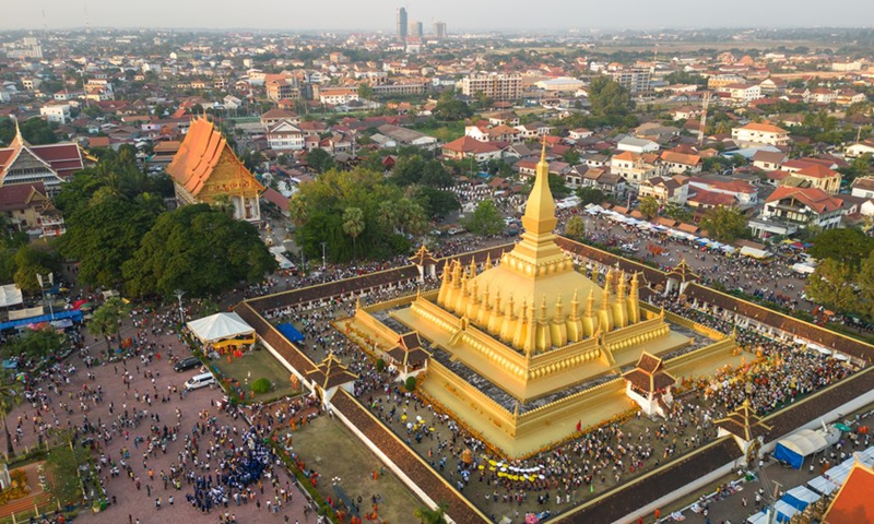 This aerial photo taken on Nov. 7, 2022 shows the That Luang Stupa in Vientiane, Laos. That Luang Festival, running from Nov. 6 to 8 in 2022, is one of the most important religious festivals in Laos.(Photo: Xinhua)