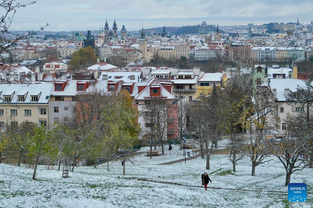 This photo taken on Nov. 26, 2023 shows a city view after snow in Prague, the Czech Republic.(Photo: Xinhua)