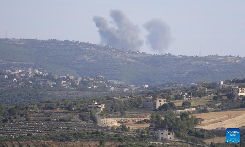 Smoke rises following an Israeli strike in Al-Quazah, Lebanon, on Dec. 4, 2023. Six Lebanese civilians were injured on Monday in Israeli artillery and missile shelling targeting several border areas in southern Lebanon, Lebanese military sources told Xinhua.(Photo: Xinhua)