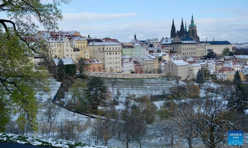 This photo taken on Nov. 26, 2023 shows a city view after snow in Prague, the Czech Republic.(Photo: Xinhua)