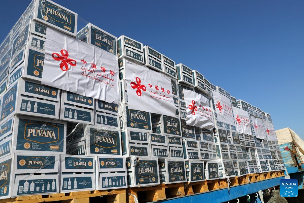 A truck loaded with humanitarian aid supplies to Gaza provided by the Chinese government waits for departure in Cairo, Egypt, Nov. 27, 2023. The ambassador of Palestine to Egypt has extended his country's sincere gratitude to the Chinese government and people for providing timely humanitarian aid supplies to the conflict-ridden Gaza Strip.(Photo: Xinhua)